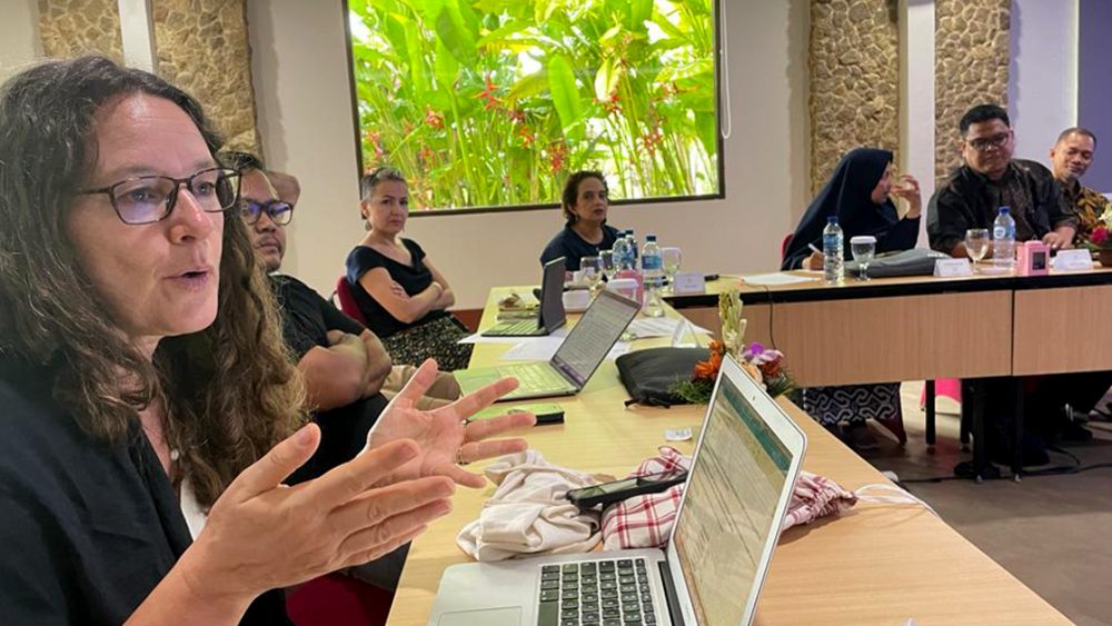 People in discussion during the midterm workshop